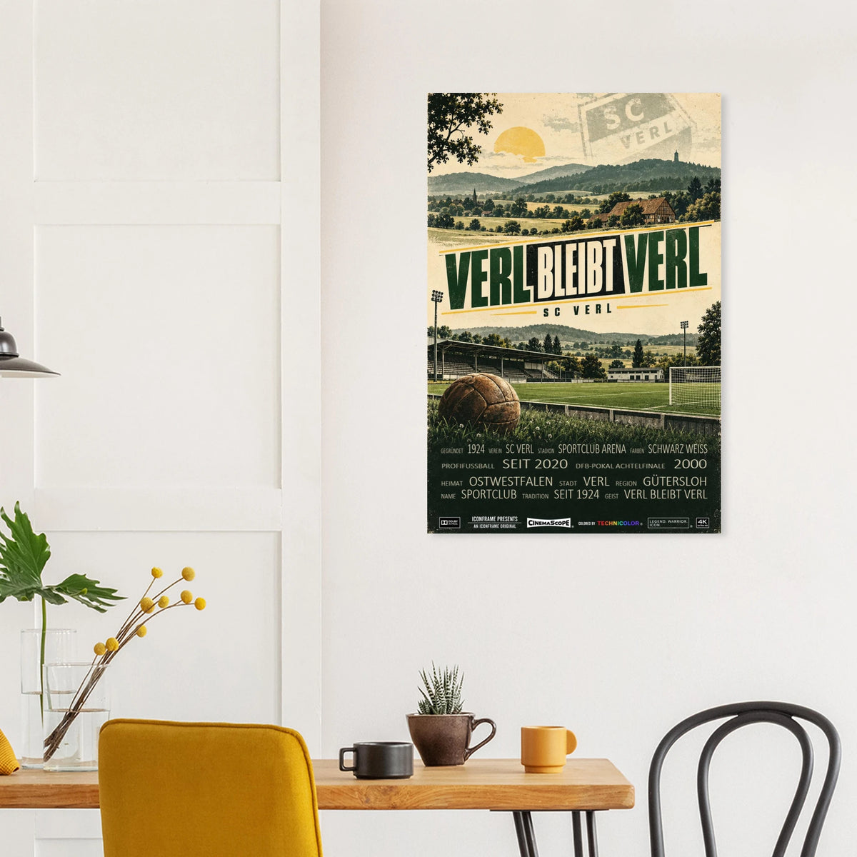 SC Verl Poster „Verl bleibt Verl“ an einer hellen Wand über einem Esstisch