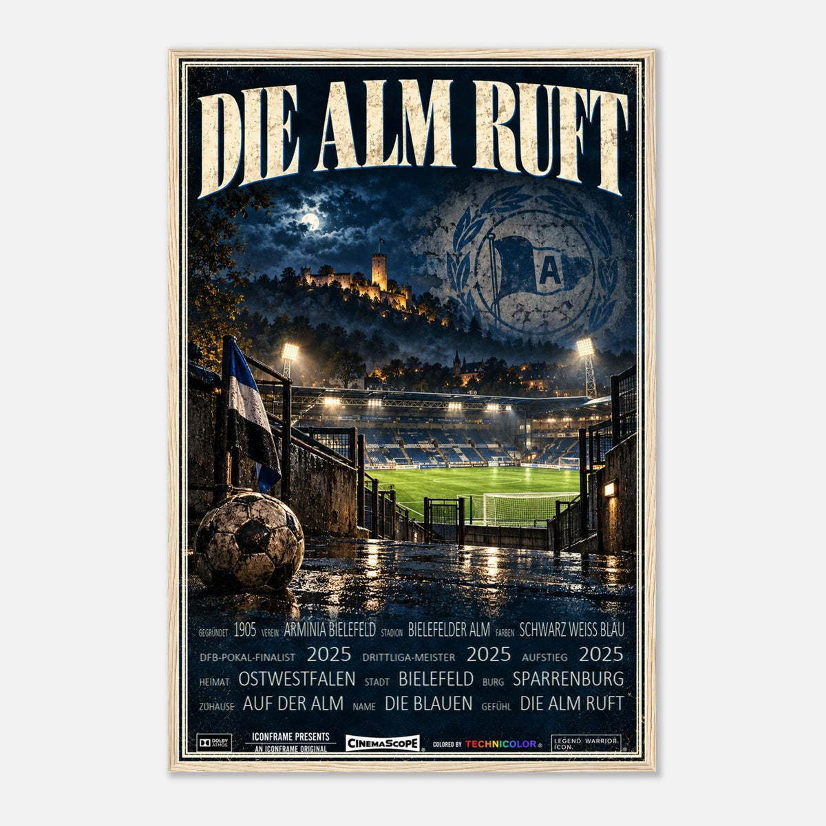 Arminia Bielefeld Poster „Die Alm ruft“ – 60 × 90 cm, mit naturfarbenem Holzrahmen vor hellem Hintergrund